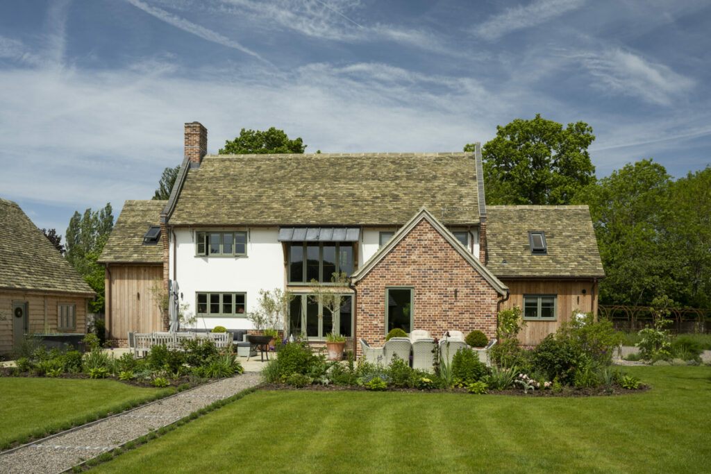 Rear of oak frame country home and garden