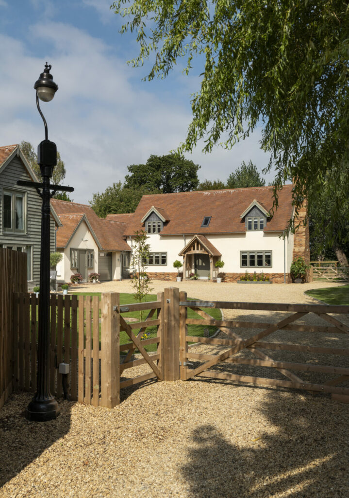 Cottage in the countryside with wooden gate