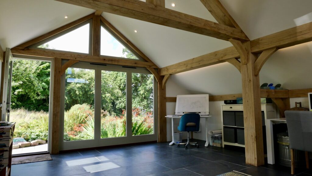 oak frame studio home office with garden outside